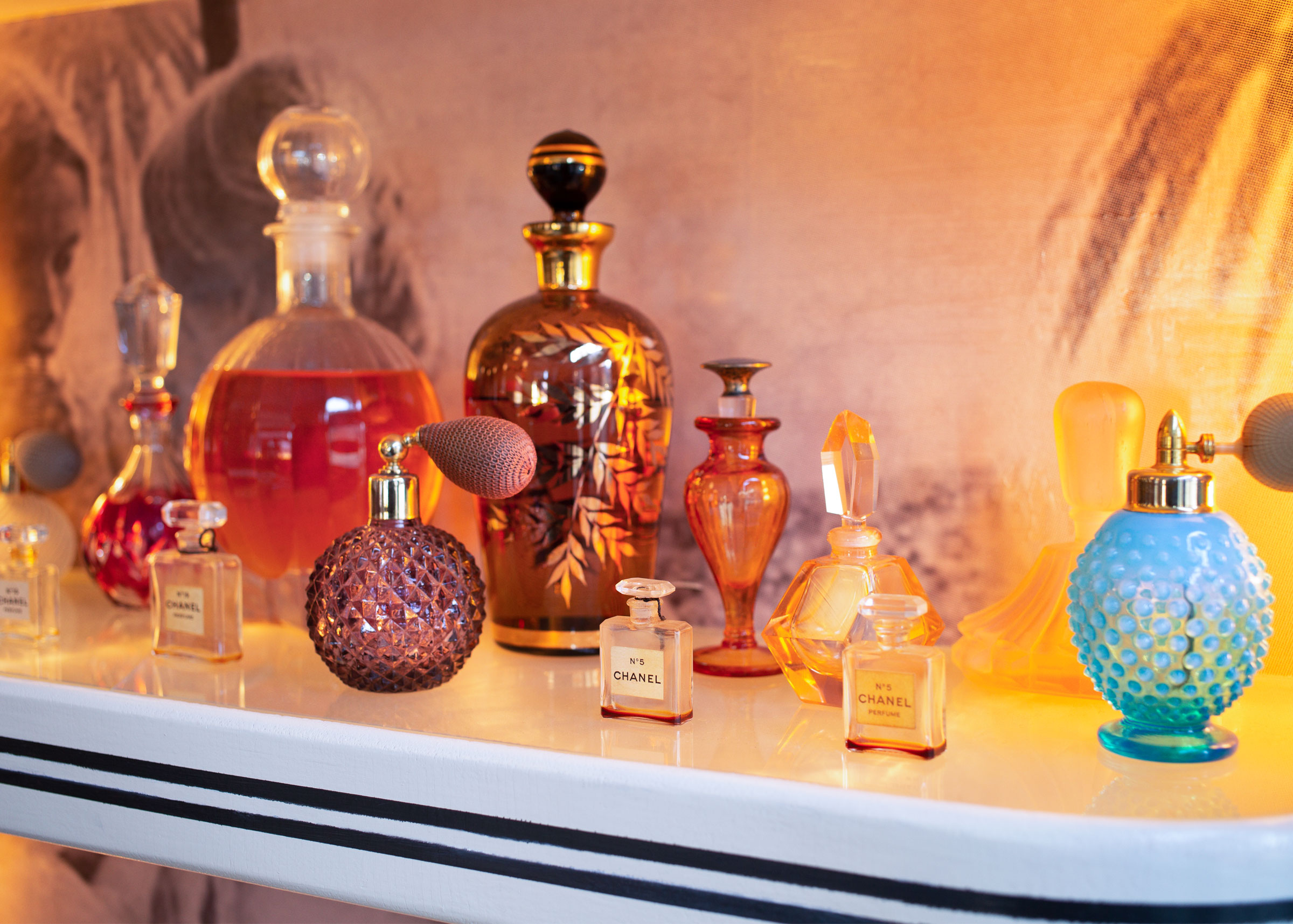 vintage perfume bottles at Chicane restaurant in soho Manhattan New York featuring Chanel Number 5